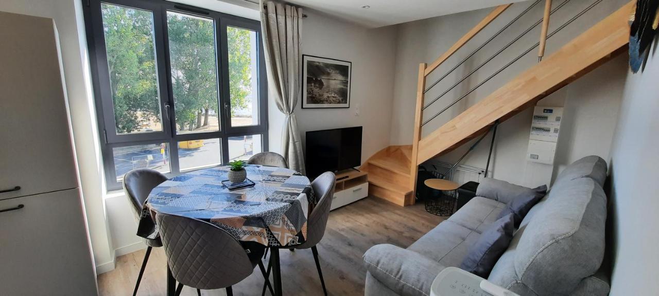 Les Appartements De La B Saint-Benoit-des-Ondes Luaran gambar