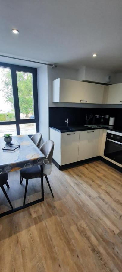 Les Appartements De La B Saint-Benoit-des-Ondes Luaran gambar