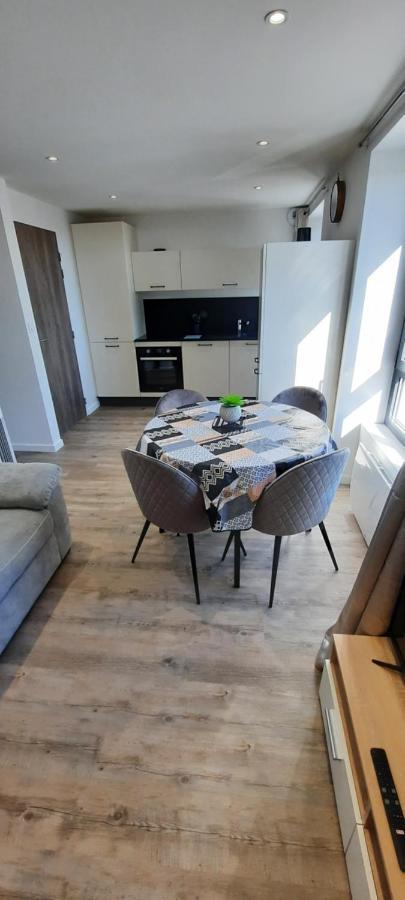 Les Appartements De La B Saint-Benoit-des-Ondes Luaran gambar