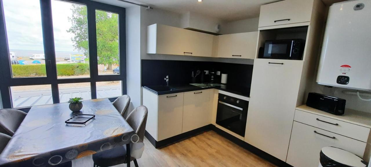 Les Appartements De La B Saint-Benoit-des-Ondes Luaran gambar