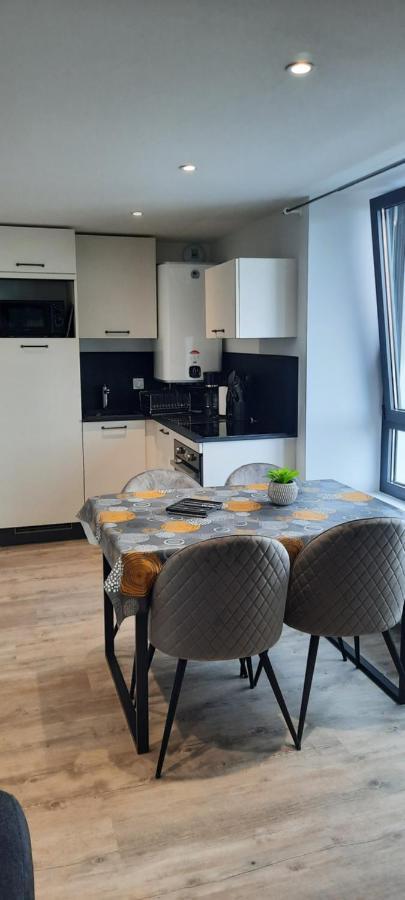 Les Appartements De La B Saint-Benoit-des-Ondes Luaran gambar